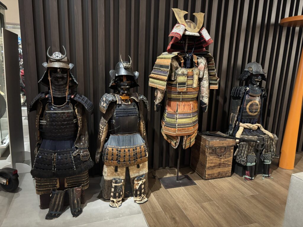 Four different sized and accesorized samurai armour.