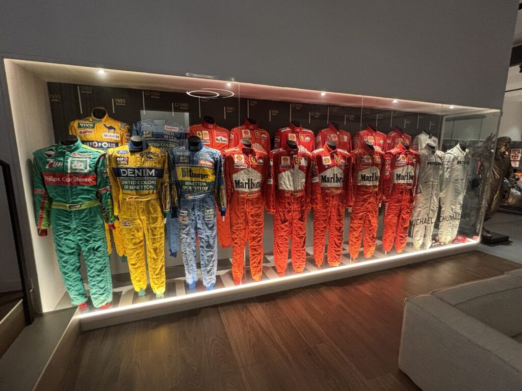 All of Michael Schumacher's racesuits from his F1 years in a vitrin.